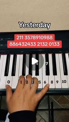 someone is playing the piano with their fingers