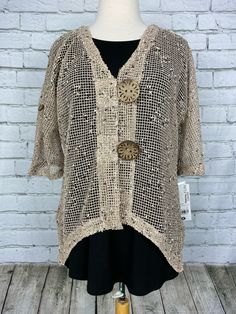 Lulu B Khaki Lace Cardigan Sizing Size Bust Waist Hips XS 34"-35" 26"-27" 37"-38" S 36"-37" 28"-29" 39"-40" M 38"-39" 30"-31" 41"-42" L 40"-41" 32"-33" 43"-44" XL 42"-43" 34"-35" 45"-46" 1X 44"-45" 36"-37" 47"-48" Fitted Beige Open Knit Outerwear, Fitted V-neck Open Knit Outerwear, Beige Summer Cardigan With Buttons, Summer Beige Cardigan With Buttons, Beige Buttoned Summer Cardigan, Beige Buttoned Cardigan For Summer, Beige One-size Tops For Fall, Beige Fitted Beach Cardigan, Beige Fitted Cardigan For Beach