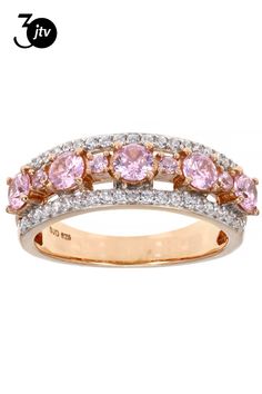 two tone gold ring with pink and white stones on the sides, set in 18k yellow gold