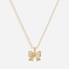 Shine bright with our Iced Bow Necklace! Made with 18k gold plating, this necklace features a charming bow design and sparkling cubic zirconia accents. Elevate any outfit with a touch of elegance and playfulness. * Colour - Gold * Made with luxury 18k Gold plated Stainless Steel * Chain Length: 40-45cm (16-18in) Bow Necklace Gold, Chic Cubic Zirconia Necklace For Gifts, Chic Gold Necklace With Bow, Gold Bow Necklace For Party, Gold Necklace With Bow For Party, Sephora Skin Care, Bow Necklace, Neck Chain, Bow Design