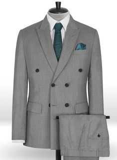 An effortless route to tailored finesse, our Worsted Mid Charcoal Wool suit is a true all-rounder. Crafted from wool blend, the classic charcoal wool suit with its versatile shade and wool blend fabric is sure to become a much-loved part of your tailoring collection. Team it with a crisp white shirt, dotted satin tie and black brogue shoes. 
 
 Look Includes  Worsted Mid Charcoal Wool Fabric  Double Breasted Jacket Style  Peak Lapel  Real Horn Royal Buttons  Single Vent  Three Cuff Buttons  Two Business Wool Double Breasted Suit With Welt Pockets, Wool Double Breasted Tuxedo Suit For Work, Tailored Double Breasted Suit With Welt Pockets, Business Double Breasted Wool Suit With Welt Pockets, Wool Double Breasted Suit For Business, Winter Double Breasted Suit With Notch Lapel, Double Breasted Wool Suit For Business, Timeless Wool Double Breasted Suit For Business Casual, Winter Business Double Breasted Suit With Pressed Crease