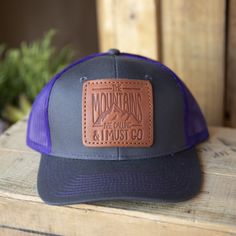 These are so much fun! There's just something about leather that draws you in and this quality leather evokes a sense of durability and timeless style. This full-grain leather patch trucker hat can be worn any season and with any outfit. It is the perfect way to keep the desert heat off your head while hiking and in turn, you are supporting our locally handcrafted leather business, located in Ivins Utah. . These leather hat patches have been hand-stamped into full-grain Wickett & Craig leath Black Leather Hats For Outdoor Activities, Rugged Leather Hat With Patch, Rugged Leather Hat With Leather Patch, Adjustable Leather Baseball Cap For Outdoor, Leather Baseball Cap For Outdoor Activities, Adjustable Leather Baseball Cap With Leather Patch, Casual Leather Baseball Cap With Leather Patch, Casual Leather Baseball Cap With Logo Patch, Casual Leather Snapback Hat Adjustable