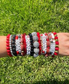 Georgia game day bracelet stack. 5 bracelet strands included in one stack. Multi material beads on elastic cord. One size fits all. Prices are based on bead material and size. Casual Stacked Stretch Bracelet For Everyday, Casual Stacked Adjustable Stretch Bracelet, Casual Adjustable Stacked Stretch Bracelet, Casual Everyday Stacked Stretch Bracelet, Red Stacked Beaded Bracelets For Gifts, Casual Stacked Bracelets With Round Beads, Red Stacked Beaded Bracelets As Gift, Casual Adjustable Stacked Beaded Bracelets, Red Adjustable Stacked Bracelets