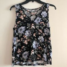 Never Worn And New With Tags. No Flaws. Says Size Small, But Is Stretchy And Will Fit Up To A Larger Medium. Black Floral Print Tank Top For Spring, Black Stretch Tops With Floral Print, Black Stretch Top With Floral Print, Black Stretch Floral Print Tops, Black Floral Print Stretch Tops, Flower Tank Top, Flower Tops, Floral Crop Tops, Floral Top