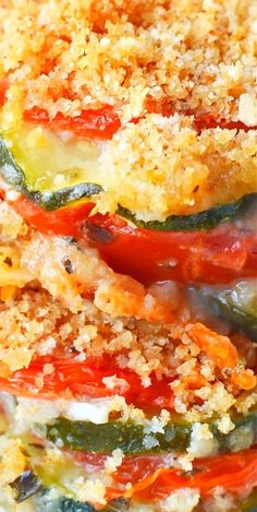 a close up of food on a plate with broccoli and peppers in it