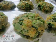 broccoli florets are sitting on top of tin foil and ready to go into the oven