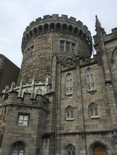 an old castle like building with many windows