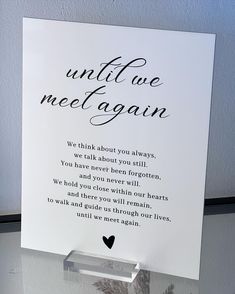 a card with the words until we meet again written on it, and a heart