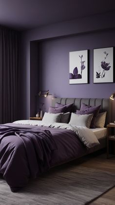 a bed with purple sheets and pillows in a bedroom next to two pictures on the wall