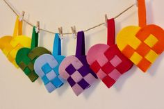 colorful felt hearts hanging on a clothes line