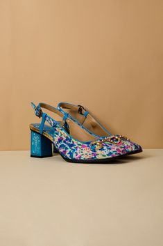 Elevate your style game with the Thalia Romance Slingback Pump by Soffia. Designed for the adventurous and romanticist, these pumps feature a bold slingback design that will make you stand out from the crowd. With a touch of romance and a hint of risk, these pumps are perfect for those who love to take fashion romantic in risks. 2.56" heel Hook & loop buckle closure Genuine leather upper Leather footbed Leather lining Leather midsole Rubber sole Party Slingback Heels With Wooden Heel, Evening Slingback Heels With Wooden Heel, Spring Slingback Heels With Wooden Heel, Fashion Romantic, Reindeer Headband, Daily Dress, Dress Jewelry, Slingback Pump, Romantic Style