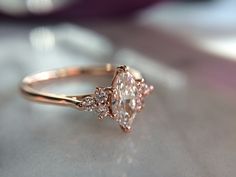 an engagement ring with three diamonds on it