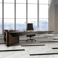 an office with marble flooring and large windows