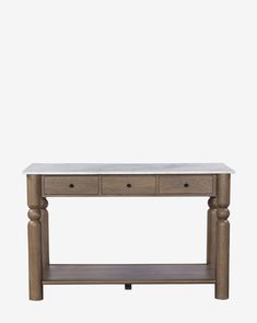 a wooden table with two drawers on one side and a marble top on the other