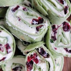 there are many rolls with cranberry fillings on the top one is rolled up