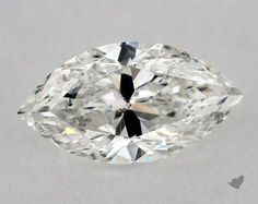 an oval cut diamond on a white surface with the center stone missing from it's face