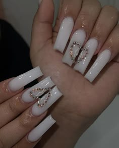 Coffin Style Acrylic Nails, White Nails And Rhinestones, Rhinestone Heart Acrylic Nails, Trendy Square Nails 2023, Cute Acrylic Nails Heart, Long Square Acrylic Nails With Diamonds Pink, Long Nail Ideas Square With Diamonds, Heart Nails Diamonds, Nails Idea With Diamond