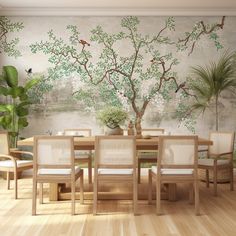 a dining room table with chairs and a wall mural