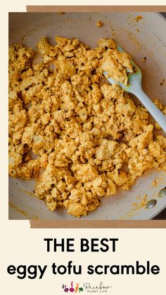 eggy vegan tofu scramble in a bowl with a spoon