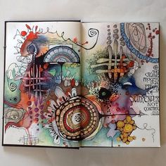 an open book with drawings on it