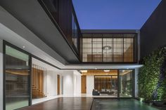 an indoor swimming pool in the middle of a house