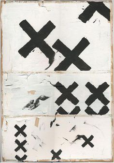 black and white artwork with crosses painted on it