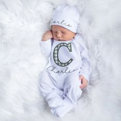 Gift an unforgettable moment with this personalized baby boy outfit! Perfect for baby showers or a newborn's first pictures. Perfect baby shower gift and coming home outfits. Sizing: Preemie up to 6 lbs Newborn up to 9 lbs 0-3m 9-13 lbs 3-6m 13-16 lbs Rompers tend to run slightly bigger to accommodate average to larger sized babies. Colors: Romper and hat are white with sage and white fabric applique letter and sage thread PLEASE NOTE: Colors may vary depending on your monitor/phone screen resolution, brightness and other settings. PLEASE NOTE: INCLUDE ONE NAME ONLY PURCHASE INCLUDES MATCHING HAT & ROMPER. PLEASE VIEW FONTS USED IN THE LISTING PRIOR TO PURCHASE. THIS IS AN EMBROIDERED ITEM Check out our Thread Color Chart﻿ if you'd like to make a custom look. Send us an email, we'd love to Baby Coming Home Outfit Boy, Baby Boy Embroidery, Coming Home Outfit Boy, Newborn Baby Boy Gifts, Baby Boy Monogram, Personalized Baby Boy Gifts, Amazing Aquariums, Newborn Baby Boy Outfit, Millennial Mom