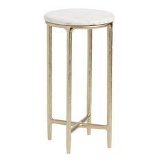 a white marble top side table with gold metal legs and an oval shaped end table