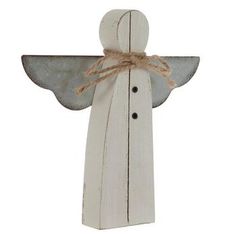 a wooden angel with two wings and a button on the back of it's body