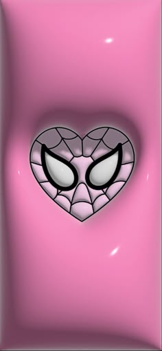 an image of a heart shaped spiderman face on pink background with eyes and nose