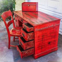 a red desk with drawers and two chairs in front of a garage door that says, rencannated with love