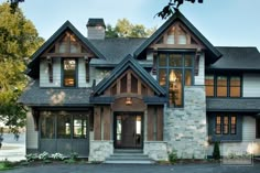 a large house with lots of windows on the front