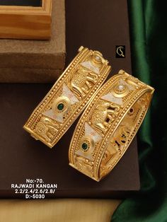 Description :- Gold Bangles/Indian Bangles/Antique gold Kada/floral bangles/temple jewelry/Amrapali bangles/ bangles/south indian jewelry Gift yourself a royal look with this perfectly crafted necklace set from Manalisstudio. Crafted with high quality stones and pearls, it is impressive in design. The green enamel artwork adds perfect texture to the design. Perfect for weddings and festivities, this antique Chuda set should be put on with your favorite sari or lehenga. 100% Satisfaction. Long La Temple Jewelry Style Bangle For Festivals, Temple Jewelry Bangle For Festivals, Gold Chandbalis Temple Jewelry For Rituals, Gold Temple Jewelry Chandbalis For Rituals, Gold Dual-tone Chandbalis For Festivals, Dual-tone Gold Chandbalis For Festivals, Gold Cutdana Bangle For Navratri, Gold Chandbalis With Intricate Design For Rituals, Gold Chandbalis For Rituals And Festivals