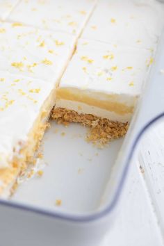 a close up of a cake in a pan with one slice cut out and ready to be eaten