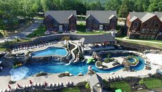 an aerial view of a resort with pool and hot tub