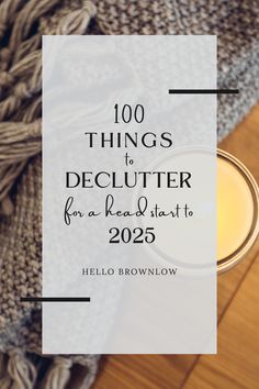 a candle with the words, 100 things to declutter for a head start to 205