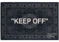 a rug with the words keep off written on it