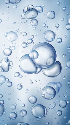 water bubbles floating in the air on a blue background