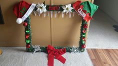 a christmas photo frame decorated with candy and decorations