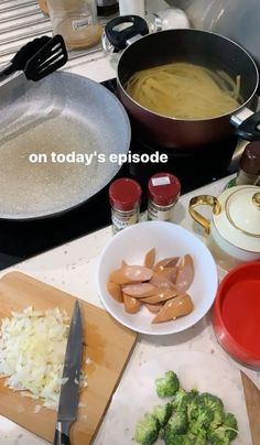 some food is being prepared on the kitchen counter for dinner time, and then ready to be cooked