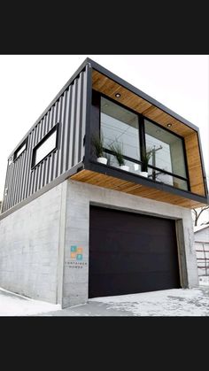 an image of a modern house made out of shipping containers