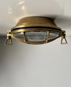 a light fixture hanging from the ceiling in a room