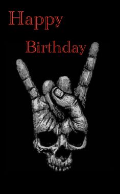 a skull holding up two fingers with the words happy birthday written on it