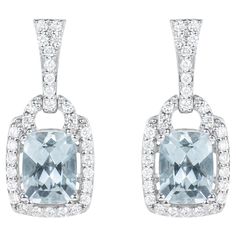 This collection features an array of aquamarines with an icy blue hue that is as cool as it gets! Accented with White Diamonds these Drop Earrings are made in white gold and present a classic yet elegant look. Aquamarine Drop Earrings in 18Karat White Gold with White Diamond. Aquamarine: 2.58 carat, 8X6mm size, cushion shape. White Diamond: 0.50 carat, 1.30mm size, round shape, G color, VS clarity. Gold: 5.96g, 18Karat White Gold. Butterfly Pin and Push Back. E464 Convertible Jewelry, Butterfly Pin, Classic Earrings, Classy Jewelry, Large Gift, Icy Blue, Aqua Marine, Gold Butterfly, Yellow Sapphire