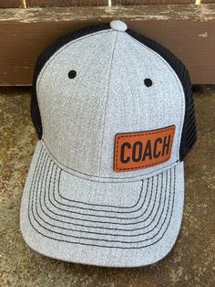 Looking for something different to buy your Coach?  Gift one of our custom made hats to the Coach in your life! You get to choose the color of hat, and then we make the Genuine Leather Coach patch in house from only the finest leather. These hats are custom to our shop and we make them when you order!  Make sure and browse our selection of women's hats too! Quality and Customer Service are our Top Priority, so please message us with any questions! We are a new shop on Etsy, but we are an established small business in McKinney, TX. Feel free to look at our FB page for a wide range of our work. https://www.facebook.com/restoringwithlove/ Font: Coach will be in the font shown in the pictures unless you message us prior to ordering and request something different. Hats: Choose the hat color yo Coach Hat, Custom Made Hats, Different Hats, Coach Gift, Football Coach, Leather Coach, Women's Hats, Coach Gifts, Gift Teacher