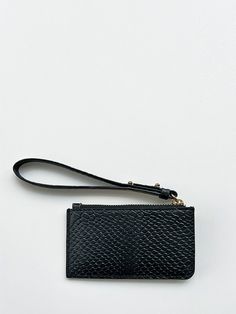 This slim and lightweight cardcase is an every day essential to throw in any bag or in your pocket. It features a 7” wristlet pull with metal pegs that open to accommodate your keys. The exterior has four dedicated card slots and the main zippered compartment holds additional cards and/or cash. Redefine your everyday carry with a touch of luxury and practical elegance. PLAY CARDCASE FEATURES Sustainable Up-cycled embossed leather 100% cotton twill lining 7" Wristlet pull with key slot 4 Exterior Changing Pad, Pet Mat, Everyday Carry, Small Leather Goods, Black Backpack, Cotton Totes, Cotton Tote Bags, You Bag, Embossed Leather