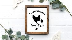 a sign that says farmer's market fresh eggs and chicken