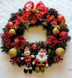 a christmas wreath with ornaments and decorations