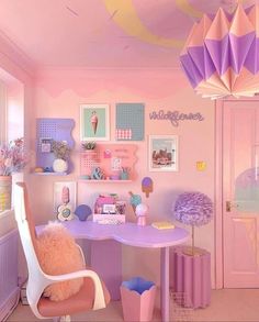 a room with pink walls and decorations on the ceiling, including a purple desk and chair