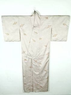 "Japanese Kimono Robe Brown Floral Kimono Dress | Floral Kimono | Kimono Cardigan | Long Kimono Robe | Yukata kimono Please check the measurements we have provided to ensure a proper fit. ▪️ MEASUREMENTS ▪️ Width (shoulder seam to shoulder seam): 23.5\" Inches. Length (from base of collar to bottom): 63\" Inches. End Sleeve to End Sleeve : 51\" Inches Good Condition. Please enlarge the photos to get clear image. All measurements are taken with the garment flat on the ground. Customs Tax or Fees Traditional Fitted Kimono With Kimono Sleeves, Beige Embroidered Kimono With Kimono Sleeves, Traditional Beige Kimono For Spring, Traditional Beige Cotton Kimono, Traditional Beige Long Sleeve Kimono, Traditional Long Sleeve Beige Kimono, Traditional Cream Long Sleeve Kimono, Traditional Long Sleeve Cream Kimono, Gilet Kimono